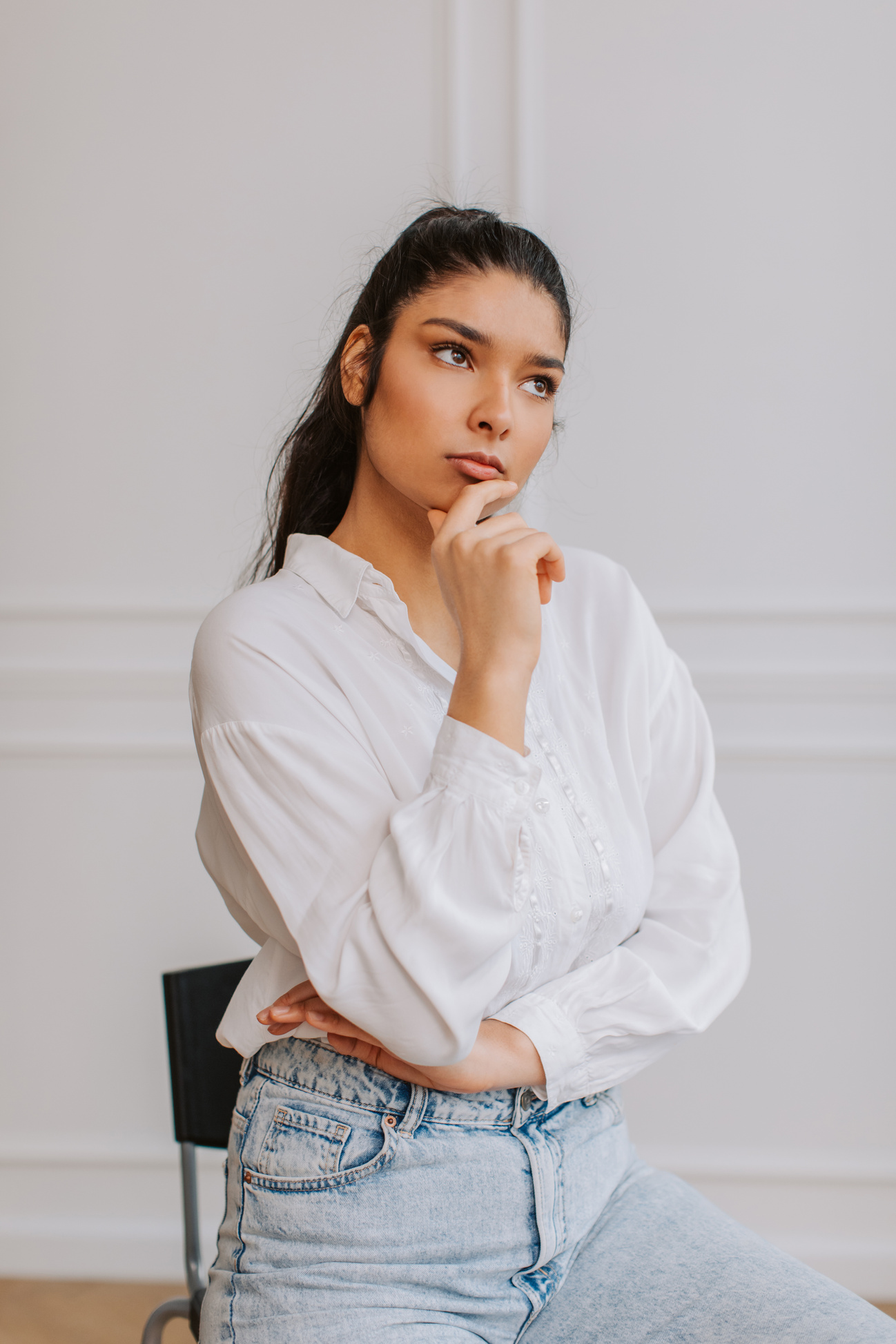 Pensive Woman in a Room